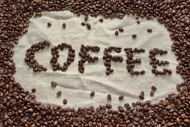 Chicchi di caffè formati in parola caffè
 - Foto, immagini