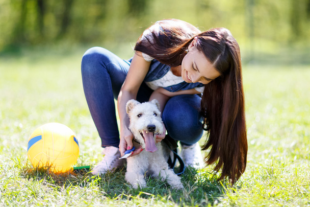 portrait of Beautiful young girl with her dogs - Foto, Imagen