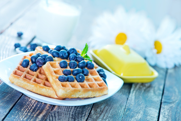 Waffle with blueberry on plate - Fotoğraf, Görsel