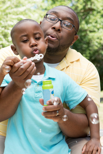 African American father and son - Фото, зображення