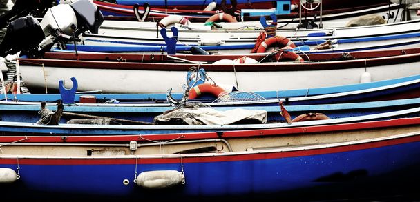 rowing boats and motor boats moored at the pier - Photo, Image