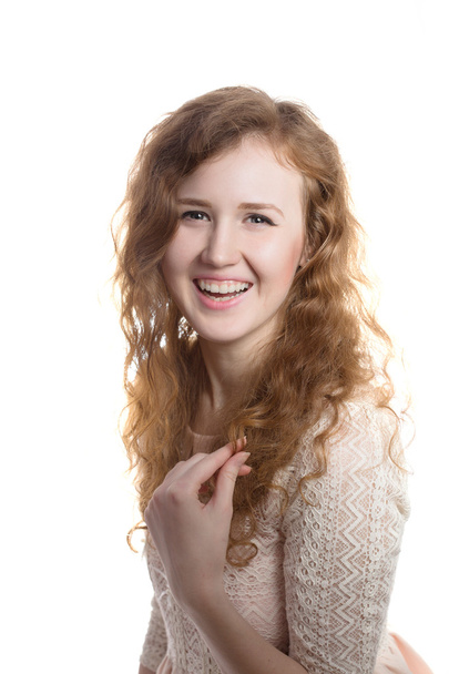 Young pretty curly girl smiling - Фото, зображення