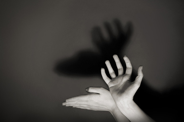 Hands gesture like deer on gray background - Foto, immagini