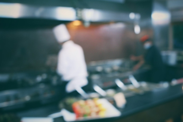 Blurred of restaurant kitchen with chef - Φωτογραφία, εικόνα