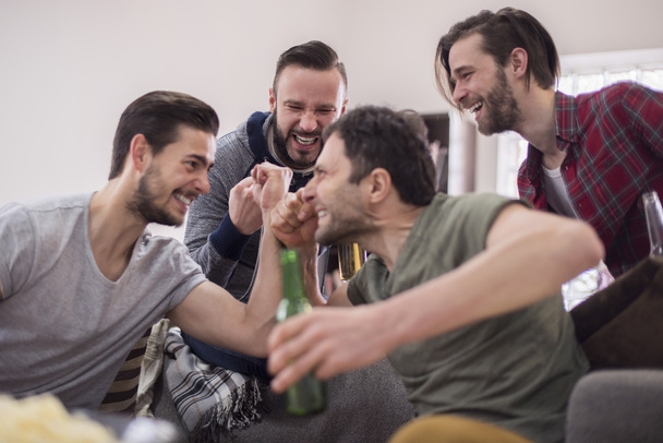 Men celebrating victory of football team - Photo, Image