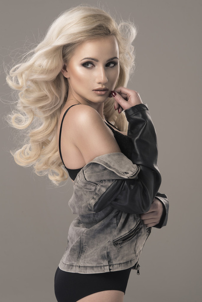 Sexy blond woman in jeans jacket - Фото, зображення