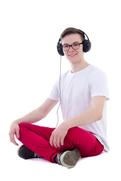 όμορφος εφήβου στα ακουστικά κάθεται και να ακούει μουσική μου - Φωτογραφία, εικόνα