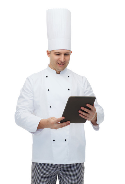 happy male chef cook holding tablet pc - Valokuva, kuva