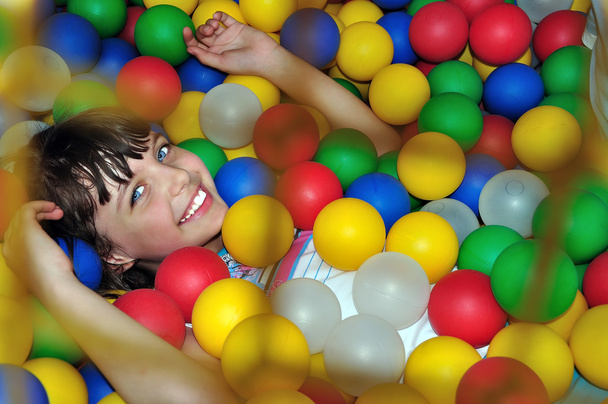 Child with balls - Foto, imagen