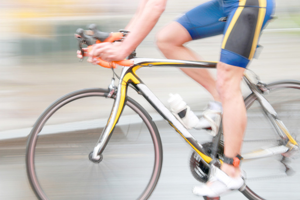 Vélo homme bleu rapide, vue latérale sans torse
 - Photo, image