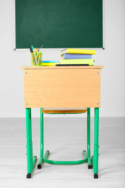 Wooden desk with stationery - Фото, изображение