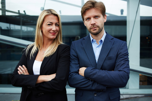business colleagues standing near office building - Foto, afbeelding