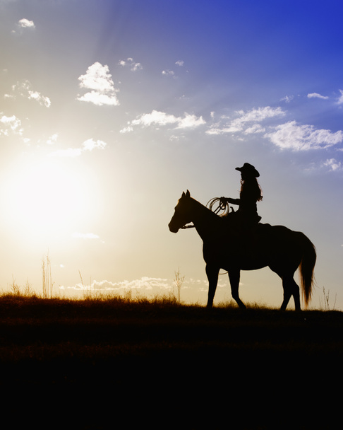 Nainen hevosen selässä
 - Valokuva, kuva