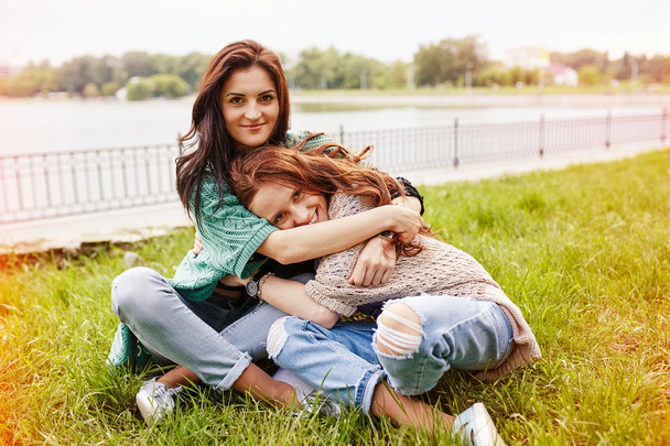 Two cheerful sisters hugging - Photo, Image
