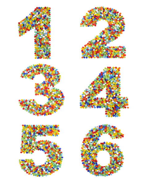 Numbers 1 through 6 made from colorful glass beads on a white - Photo, Image