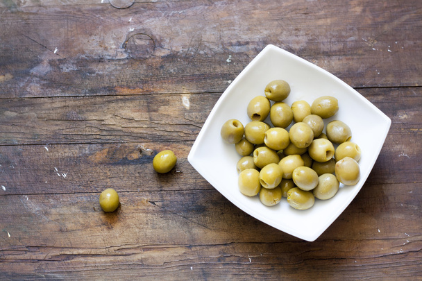 Зелені оливки в маринаді
 - Фото, зображення