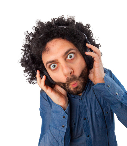 Young surprised man with headphones - Photo, Image