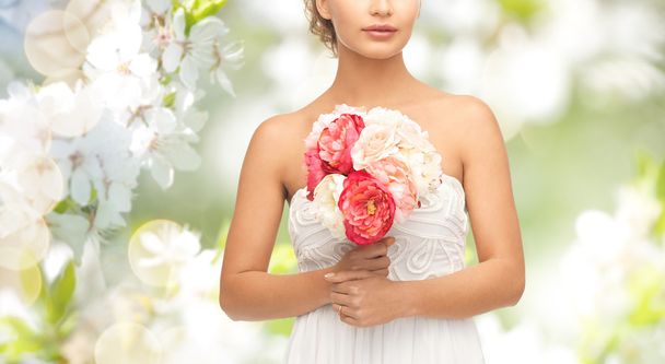 bride or woman with bouquet of flowers - Foto, Imagem