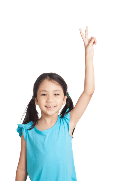 Little asian girl show victory hand sign - Photo, image