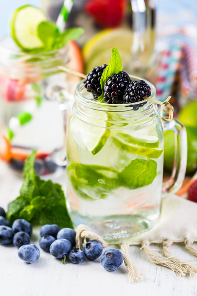 Infused water with fresh berries. - Photo, Image