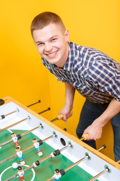Happy friends playing table hockey - Photo, Image