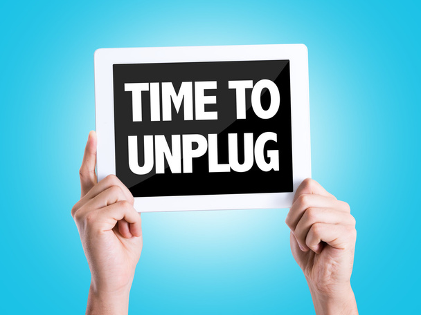 Tablet pc with text Time To Unplug - Photo, Image