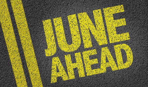 June Ahead text on the road - Photo, Image