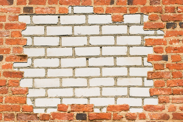 Parede de tijolo cercada com outra parede
 - Foto, Imagem