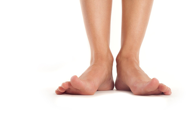 női lábak szétálló ujjaival - Fotó, kép