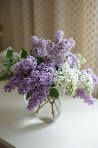 Bunch of lilac on the table - Φωτογραφία, εικόνα