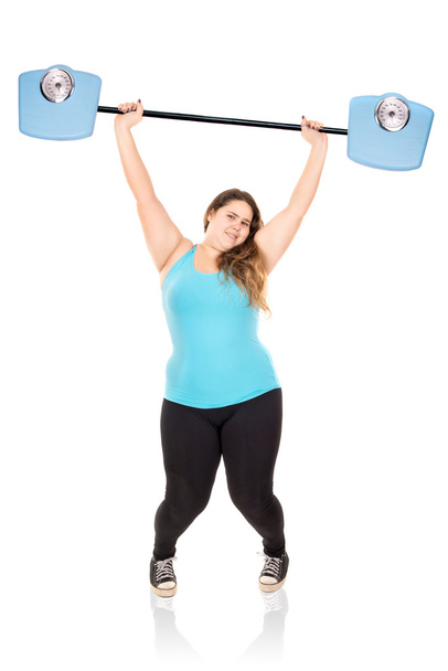 large girl lifting weights - Fotografie, Obrázek