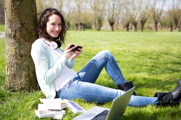 Young attractive woman realxing at the park  - Photo, Image