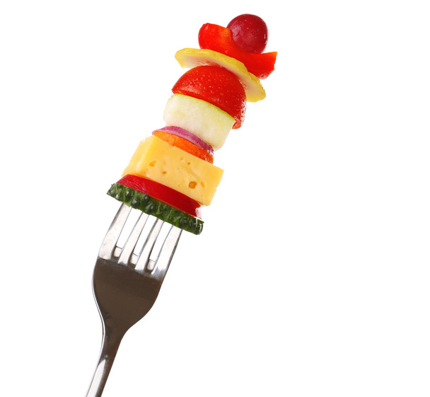 Snack of vegetables on fork isolated on white - Foto, Bild