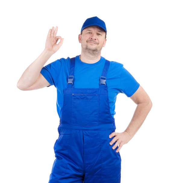Worker in blue overalls.  - Φωτογραφία, εικόνα