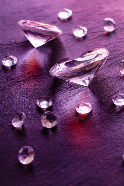 Different diamonds with purple light - Photo, Image