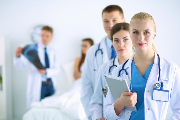 Portrait of group of smiling hospital colleagues standing together - Photo, Image