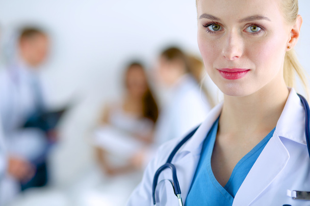 Woman doctor standing with stethoscope at hospital  - Foto, immagini