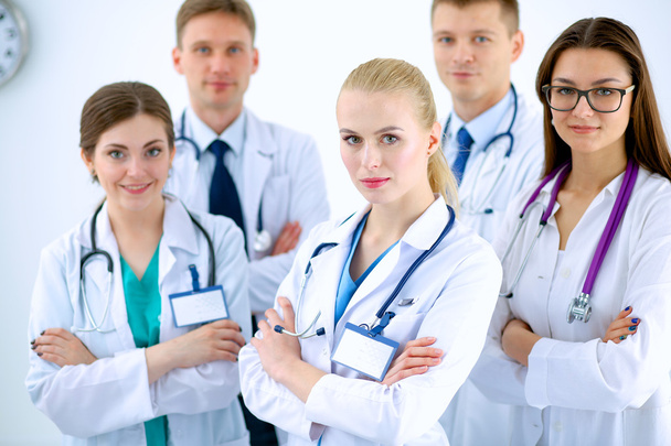 Portrait of group of smiling hospital colleagues standing together - Foto, Imagem