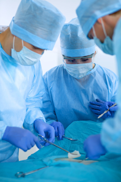 Surgery team in the operating room - Foto, Bild