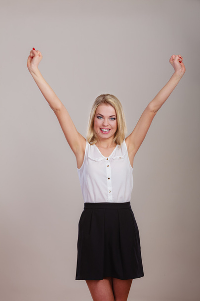 Blonde girl spreading hands with joy - Foto, immagini