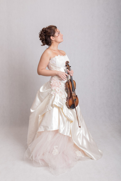 Chica con violín
 - Foto, imagen
