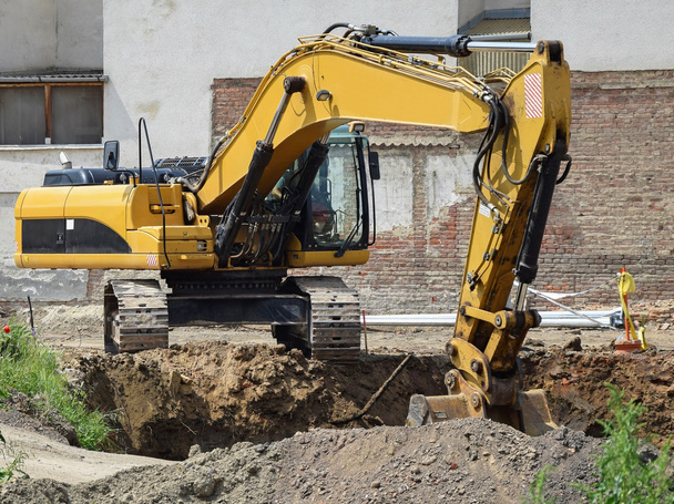 Excavator at the road construction - Photo, Image