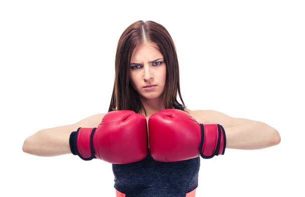 Serious sporty woman with boxing gloves - Zdjęcie, obraz