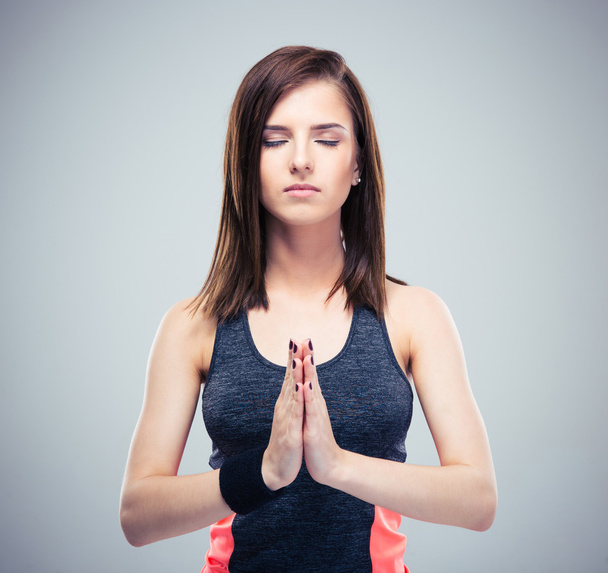 Fitness pretty woman in meditation  - Zdjęcie, obraz