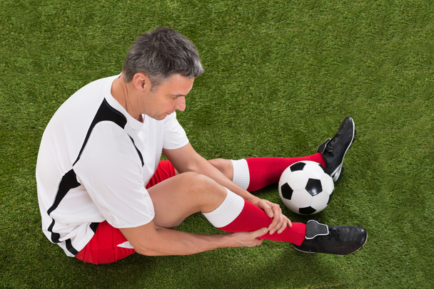 Soccer Player With Injury - Foto, Imagen