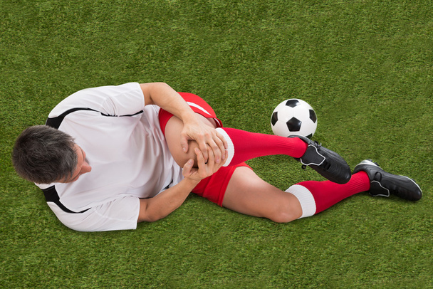 Soccer Player With Injury - Φωτογραφία, εικόνα