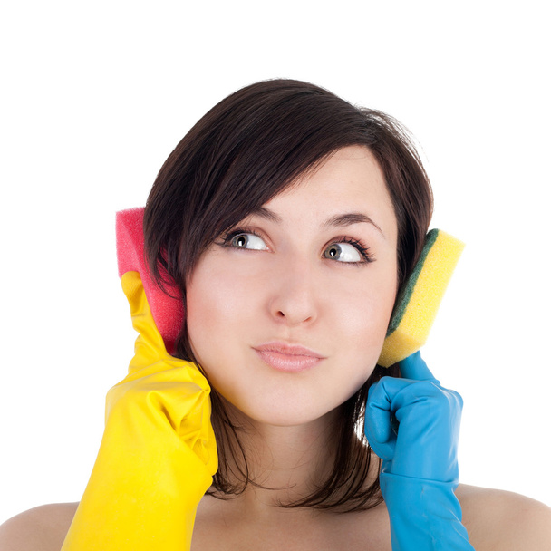 Girl in the rubber gloves with the cleaning sponges - Photo, Image