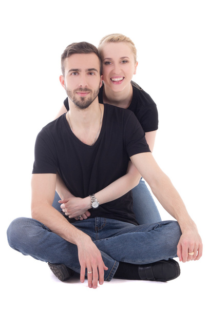 щасливий молодий чоловік сидить на підлозі зі своєю дівчиною ізольовані
 - Фото, зображення