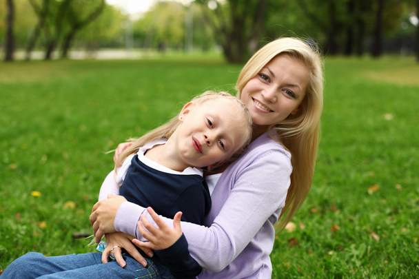 Mother and daughter in park - Photo, image