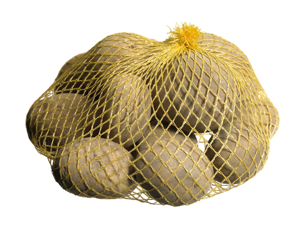 Potatoes in a net - Photo, Image